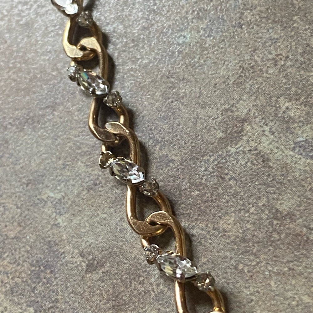 O-1: Krementz very sparkly unique infinity link tennis bracelet-Marquis & rounds